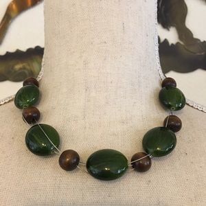 Glass and wood floating bead fish line necklace